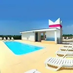 Sunny Terrace And Modern Comforts By The Pool *